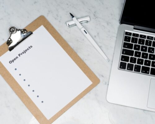 clip board and laptop