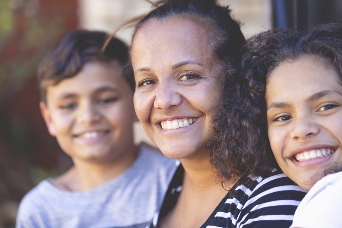 First Nations family smiling