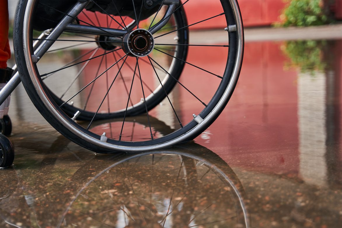 Wheelchair in floodwater